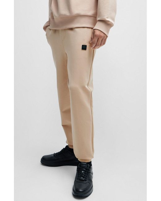 HUGO Natural Stretch-cotton Tracksuit Bottoms With Stacked Logo for men
