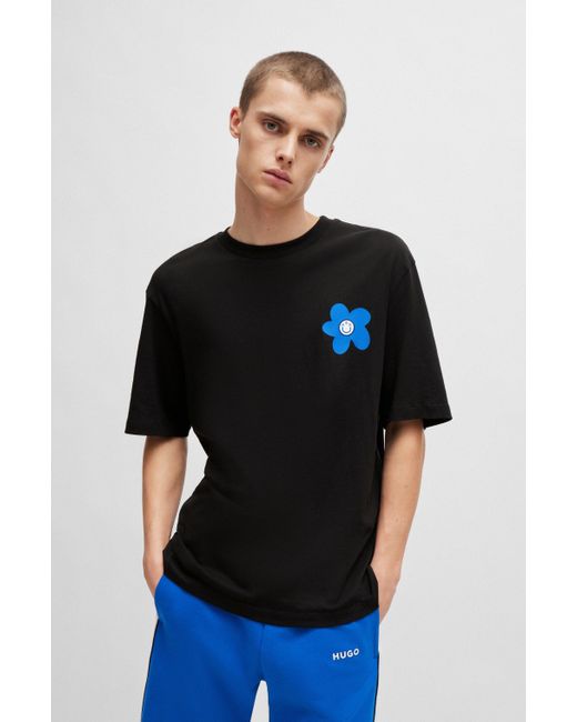 HUGO T-Shirt aus Baumwoll-Jersey mit Blumen-Logo-Artwork in Black für Herren