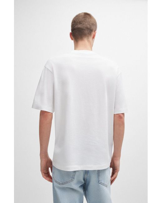 HUGO White Cotton-jersey Regular-fit T-shirt With Logo Artwork for men