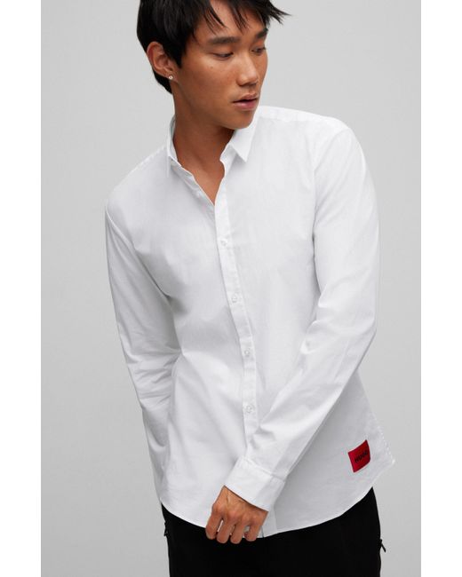 Chemise Extra Slim Fit en coton stretch avec étiquette logo HUGO pour homme  en coloris Blanc | Lyst