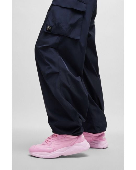 HUGO Pink Sneakers aus verschiedenen Materialien mit Kontrast-Logos