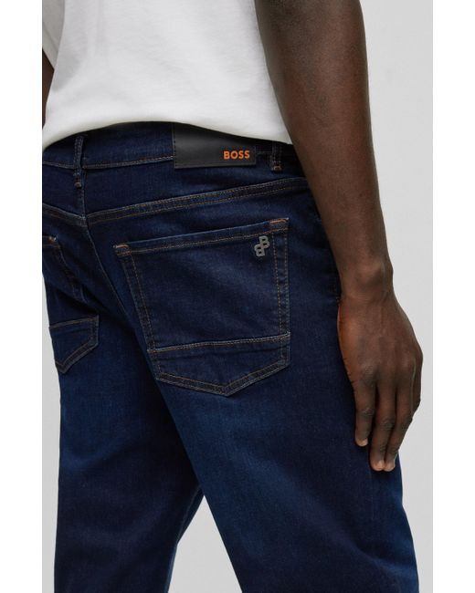 BOSS by HUGO BOSS Relaxed-fit Jeans Van Blauw Superstretchdenim in het  Blauw voor heren | Lyst BE