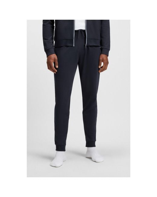 Boss Blue Cotton-Terry Tracksuit Bottoms With Logo Print for men