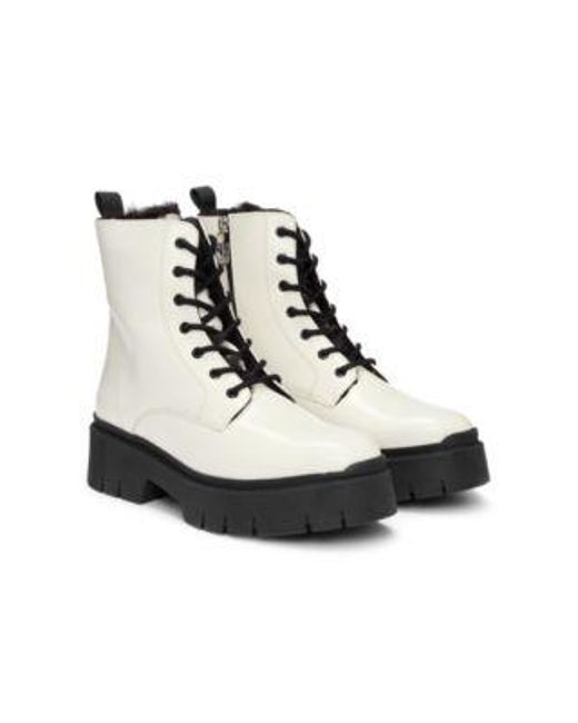 Bottines En Similicuir Avec Tirette De Fermeture Éclair À Logo HUGO en coloris White