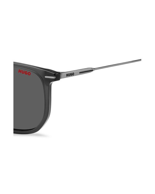 HUGO - Black sunglasses with signature-red details