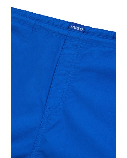 Pantalon parachute Baggy Fit en coton HUGO en coloris Blue