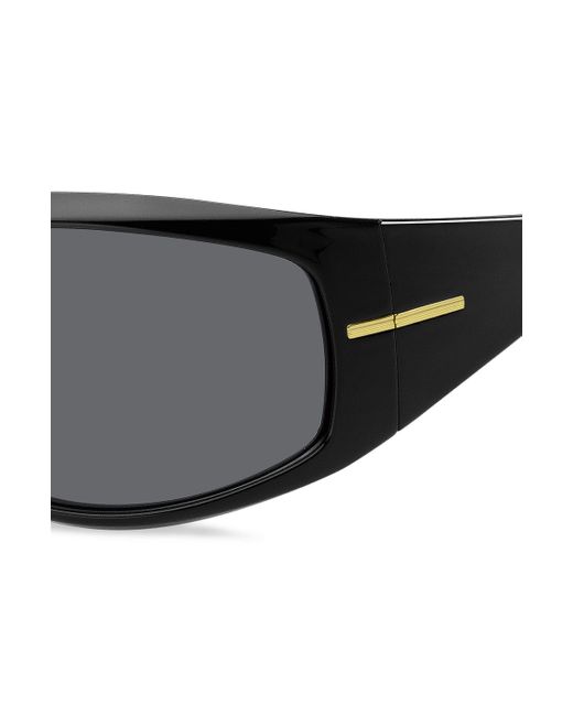 Boss Black Schwarze Sonnenbrille im Masken-Stil mit goldfarbenen Metalldetails