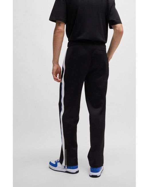 HUGO Black Logo-patch Tracksuit Bottoms With Tape Trims for men