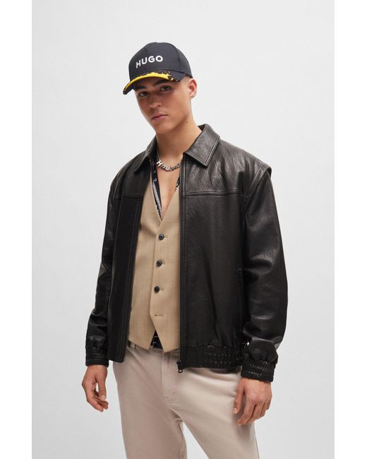 HUGO Black Leather Jacket With Detachable Sleeves And Stud Artwork for men