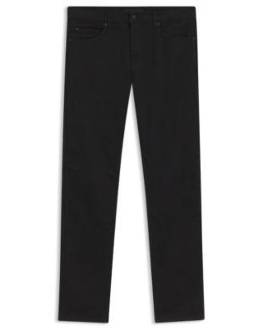 Jean Slim en denim stretch noir intense HUGO pour homme en coloris Black