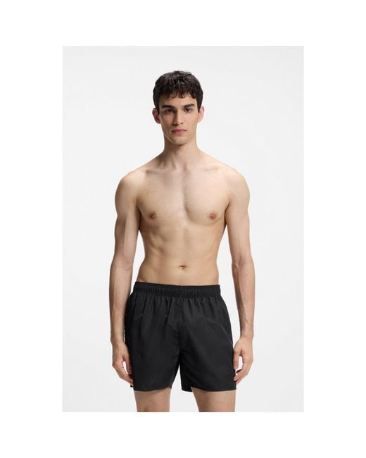 HUGO Black Swim Shorts With All-Over Stacked Logos for men