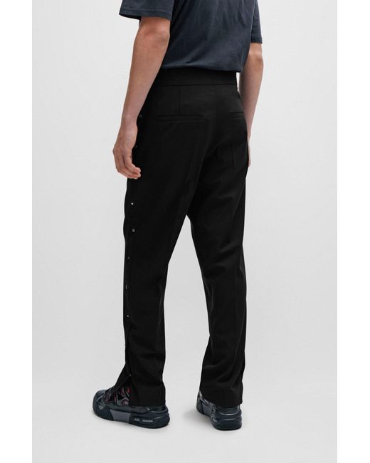 HUGO Black Slim-fit Trousers With Studded Side Seams for men