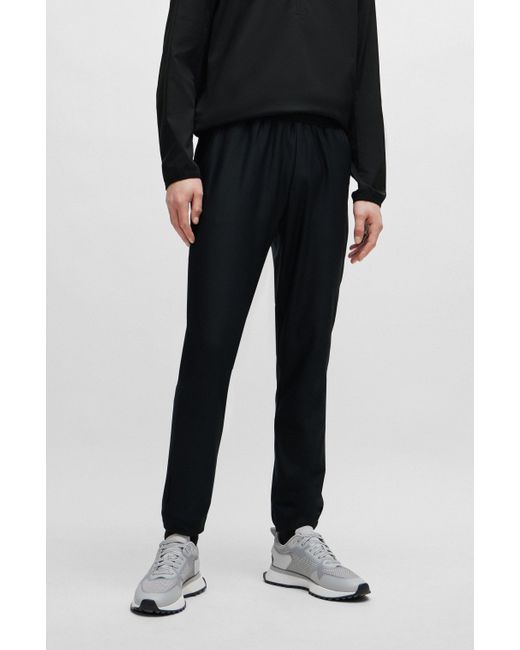 Boss Black Tracksuit Bottoms In Stretch Fabric With Decorative Reflective Logo for men