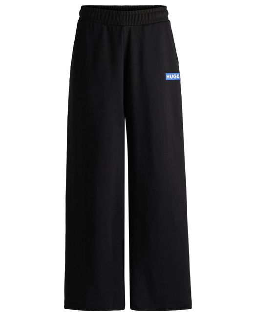 HUGO Black Relaxed-fit Tracksuit Bottoms With Logo Print