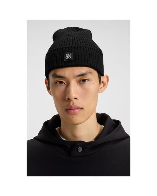 HUGO Black Virgin-Wool Beanie Hat With Stacked-Logo Badge for men