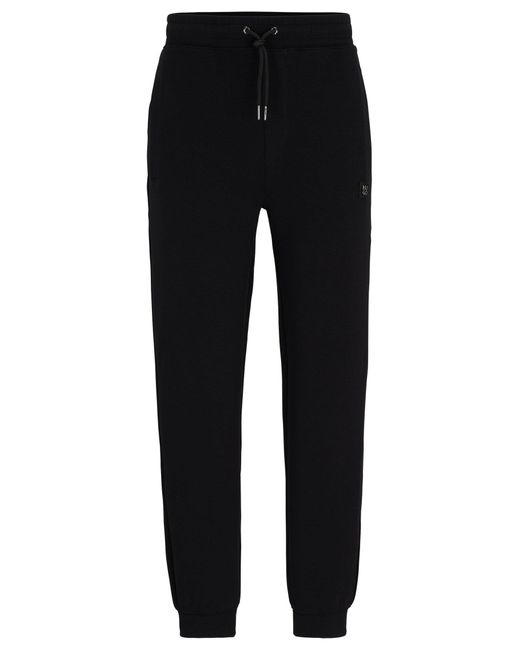 HUGO Black Stretch-cotton Tracksuit Bottoms With Stacked Logo for men