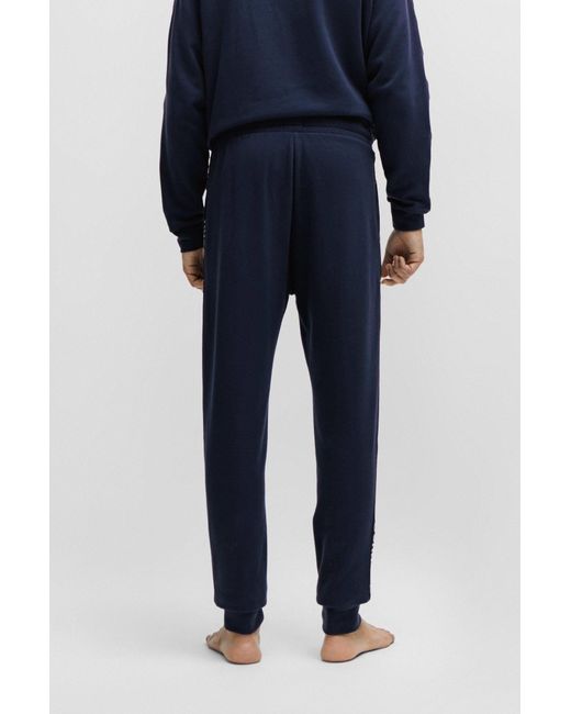 HUGO Blue Cuffed Tracksuit Bottoms In Organic Cotton With Logo Tape for men