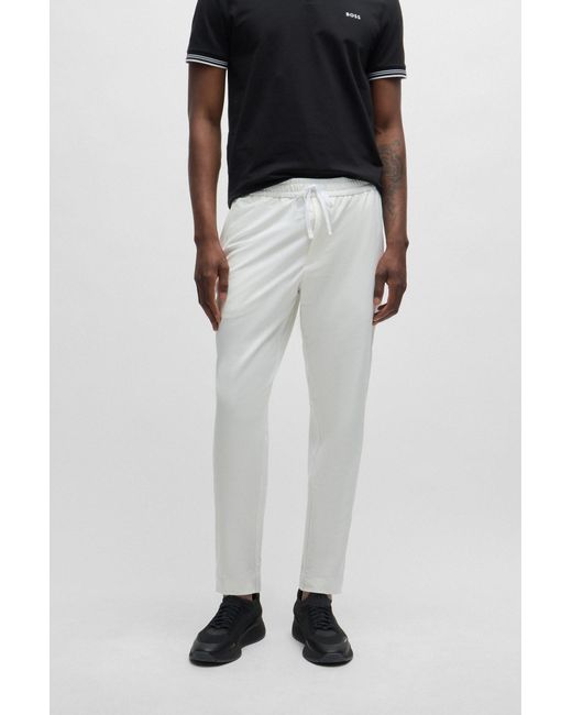 Boss White Tapered-fit Chinos In Easy-iron Four-way Stretch Fabric for men