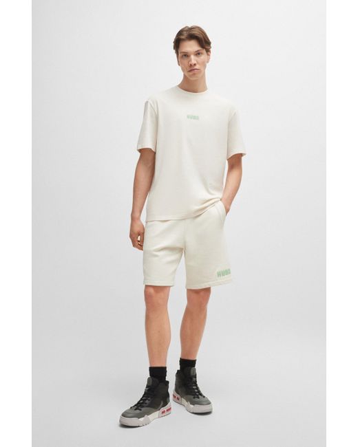 HUGO Katoenen Relaxed-fit T-shirt Met Grote Logo's Op De Rug in het White voor heren