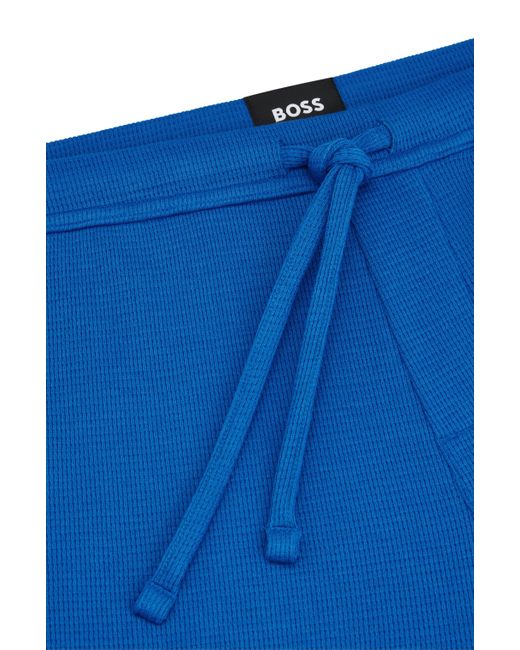Short de pyjama à la structure gaufrée avec logo brodé Boss pour homme en coloris Blue