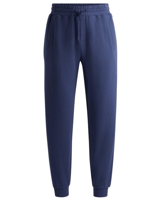 Boss Blue Cotton-terry Tracksuit Bottoms With Flocked Logo for men