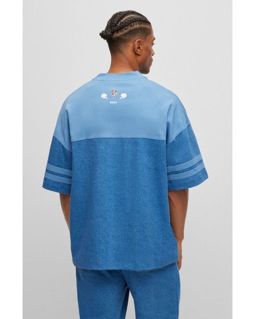 BOSS - BOSS x NFL oversize-fit tracksuit bottoms in denim-look cotton