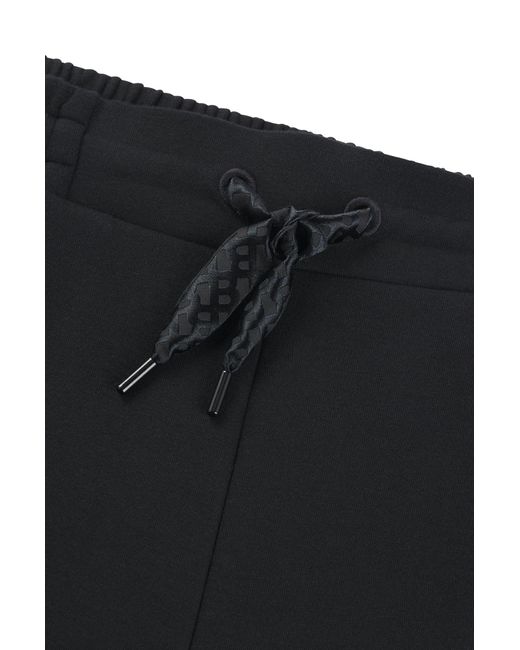 Boss Black Tracksuit Bottoms In A Cotton Blend With Piped Details