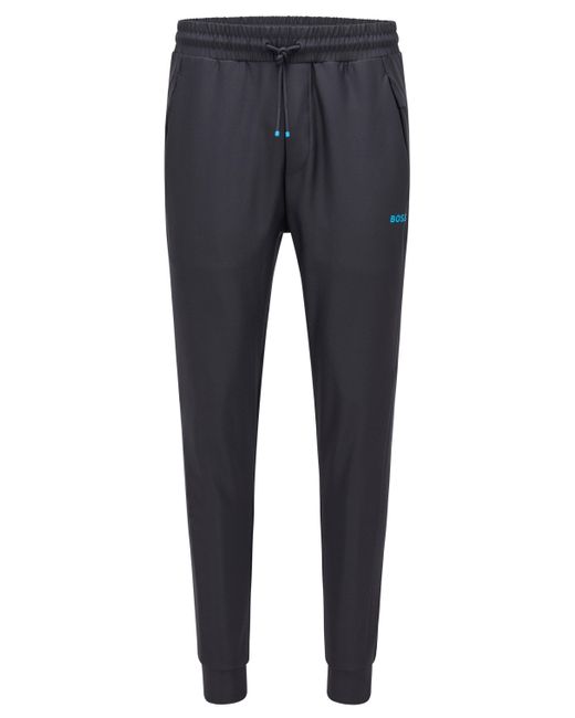 Pantaloni della tuta con riga laterale e logo a contrastoBOSS by HUGO BOSS  in Materiale sintetico da Uomo colore Blu | Lyst