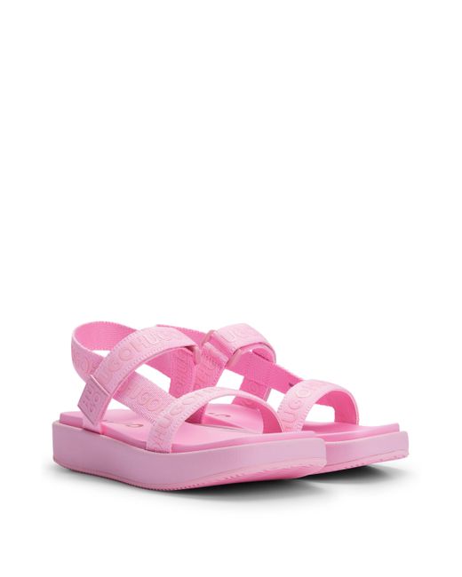 HUGO Pink Sandalen mit Stack-Logo und Branding an den Riemen