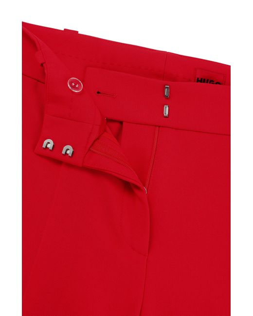 HUGO - Regular-fit bootcut trousers in stretch fabric