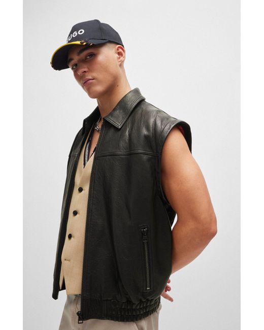 HUGO Black Leather Jacket With Detachable Sleeves And Stud Artwork for men