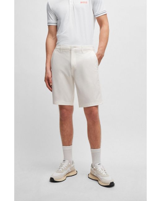 Boss Slim-Fit Shorts aus bügelleichtem Vier-Wege-Stretch in White für Herren
