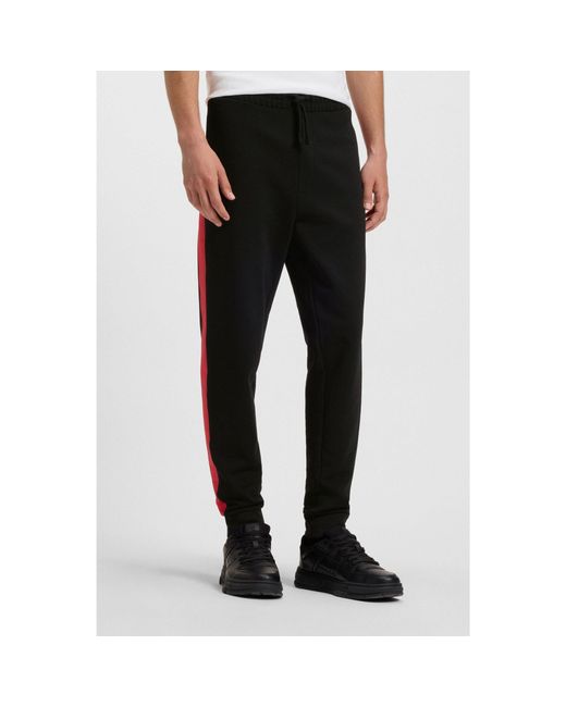 HUGO Black Cotton-Terry Tracksuit Bottoms With Contrast Side Stripes for men