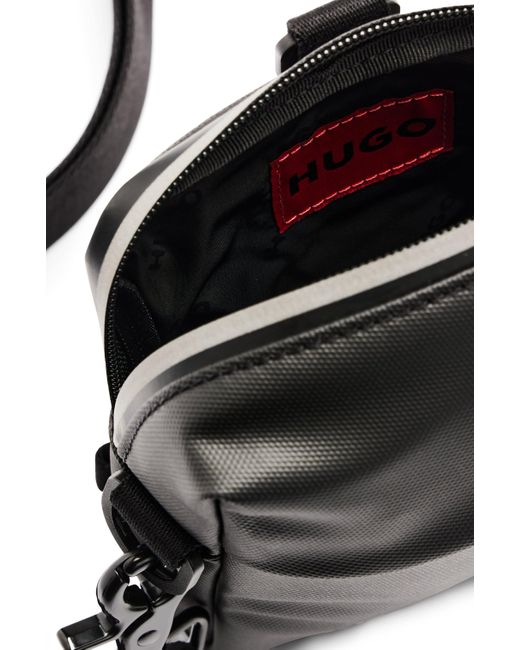 HUGO Quantum N Crossbody Reporter-Tasche mit dekorativem Logo-Print in reflektierender Optik Schwarz Stck in Black für Herren