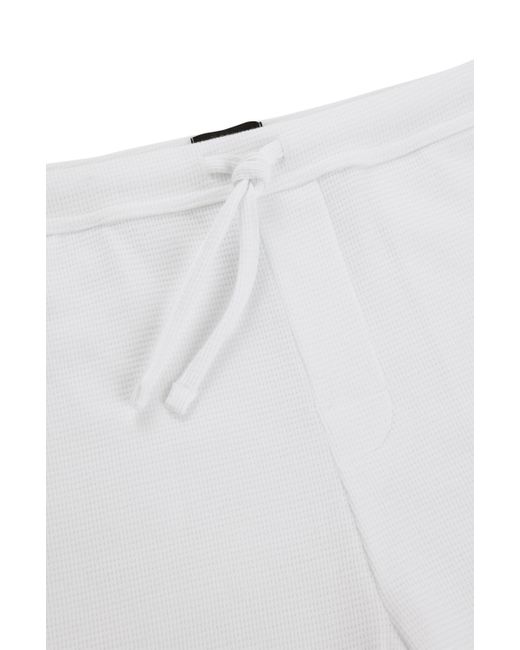 Short de pyjama à la structure gaufrée avec logo brodé Boss pour homme en coloris White