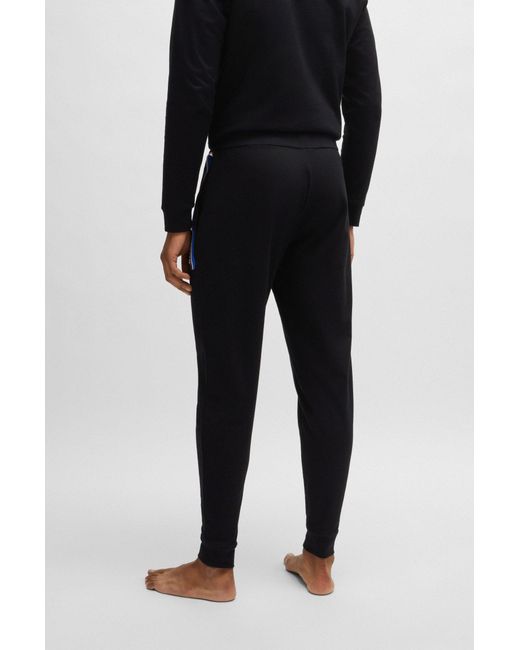 Boss Black Cotton-terry Tracksuit Bottoms With Stripes And Logo for men