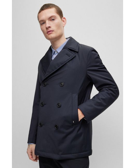 Manteau Slim Fit en laine stretch à la finition déperlante BOSS by HUGO  BOSS pour homme en coloris Bleu | Lyst