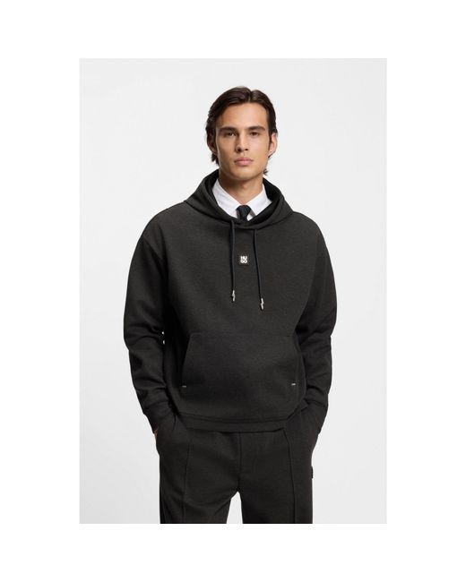 HUGO Black Relaxed-Fit Hoodie With Stacked Logo for men