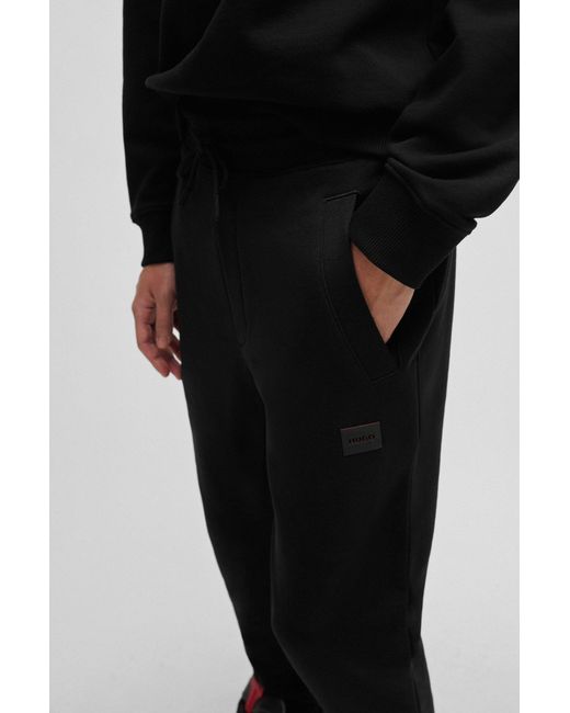 HUGO Black Cotton-terry Tracksuit Bottoms With Logo Detail for men