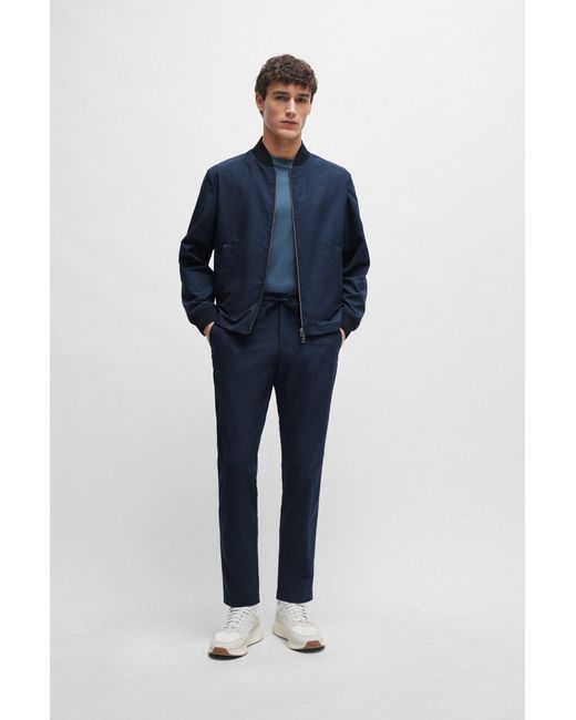 Boss Blue Slim-fit Trousers In Wrinkle-resistant Mesh for men