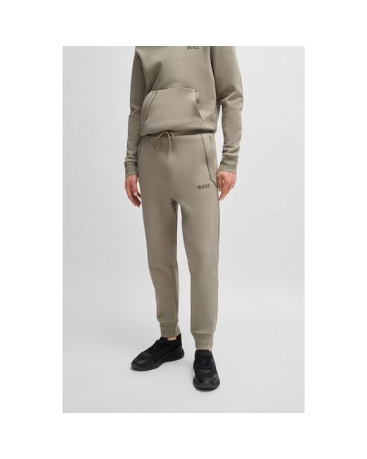 Boss Natural Cotton-Blend Tracksuit Bottoms With Mirror-Effect Logo for men