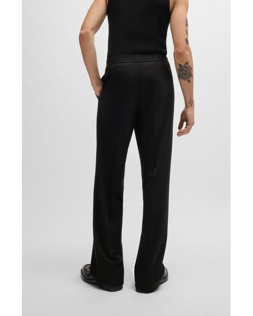 HUGO Black Relaxed-fit All-gender Trousers With Elasticated Waistband