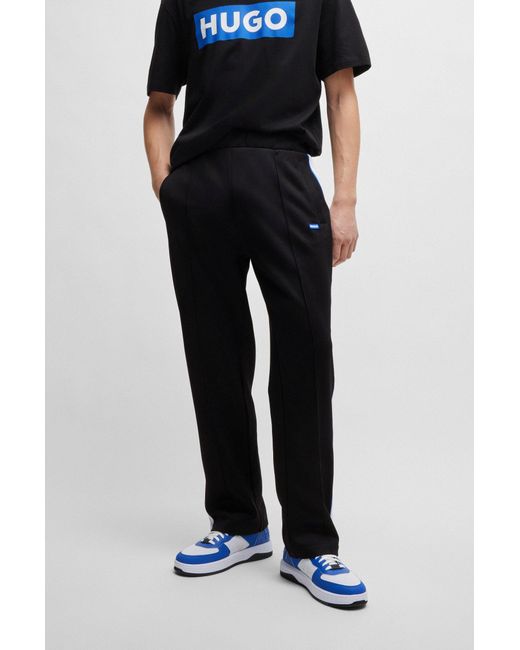 HUGO Black Logo-patch Tracksuit Bottoms With Tape Trims for men
