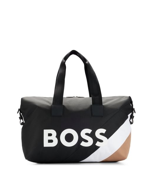 Bolso de viaje BOSS x Matteo Berrettini con logo y raya de la marca BOSS by  HUGO BOSS de hombre de color Negro | Lyst