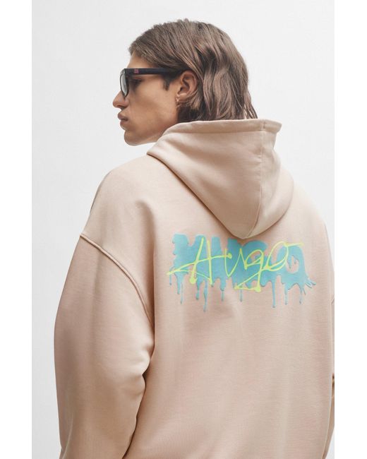 HUGO Natural Cotton-terry Oversized-fit Hoodie With Seasonal Logos for men