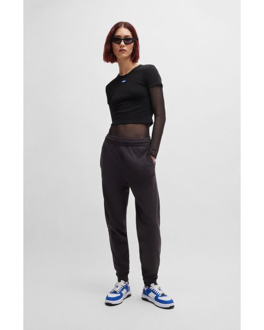 Body Slim Fit en mesh avec logos HUGO en coloris Black