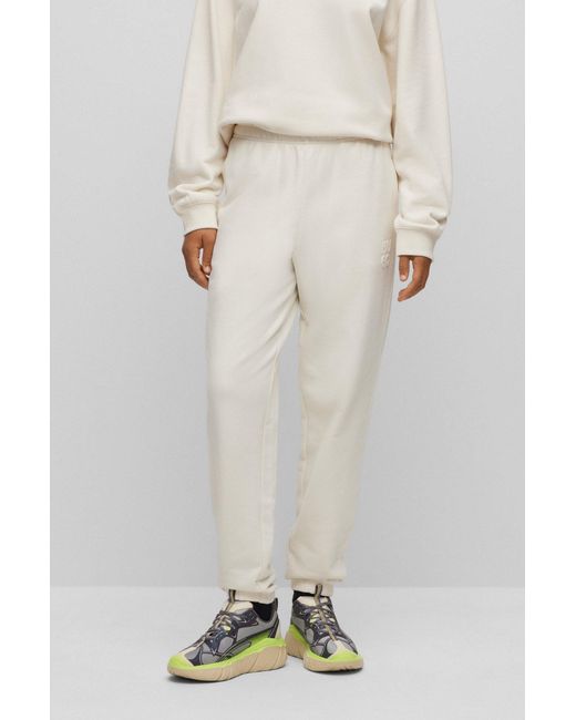 HUGO White Relaxed-fit Tracksuit Bottoms With Embossed Stacked Logo
