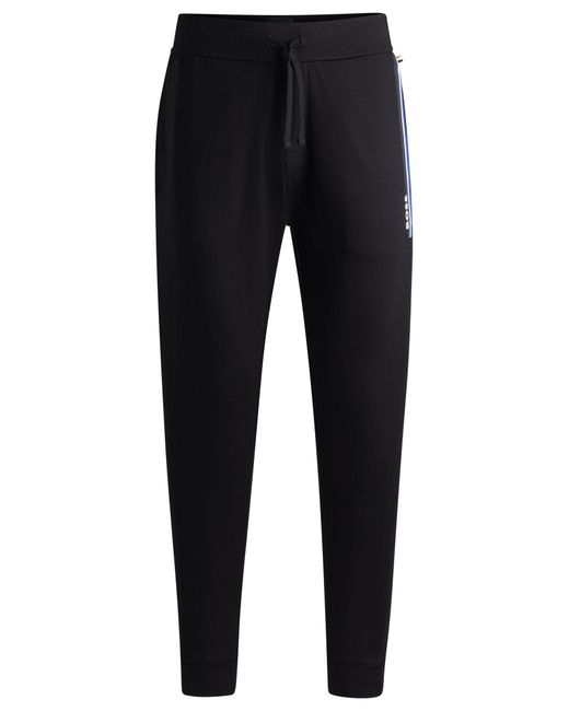 Boss Black Cotton-terry Tracksuit Bottoms With Stripes And Logo for men
