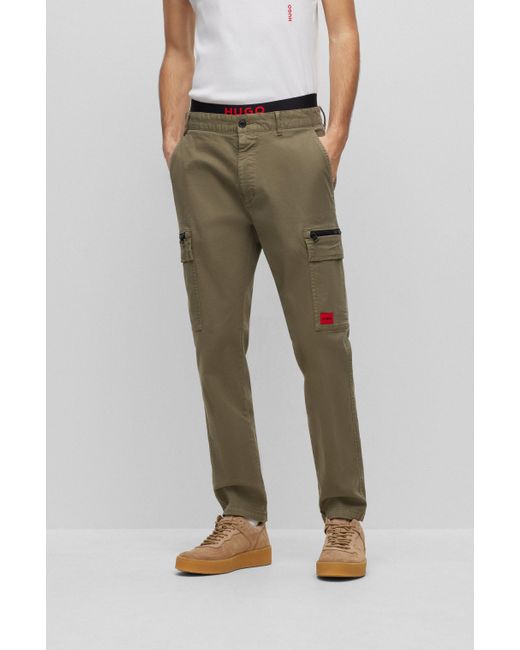 BOSS by HUGO BOSS Slimfit Cargo Trousers With Red Logo Label in Green