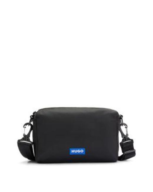 Sac porté croisé en twill structuré avec logo bleu HUGO en coloris Black